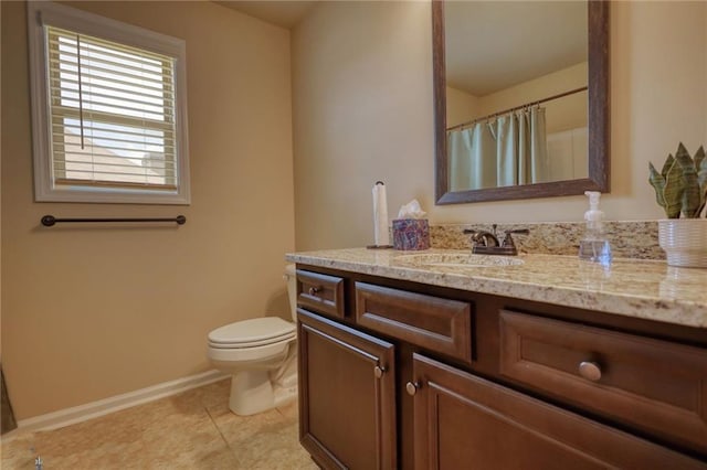 200 Baumgard Way, Locust Grove, GA 30248 - full bathroom with vanity, toilet, baseboards, and tile patterned flooring