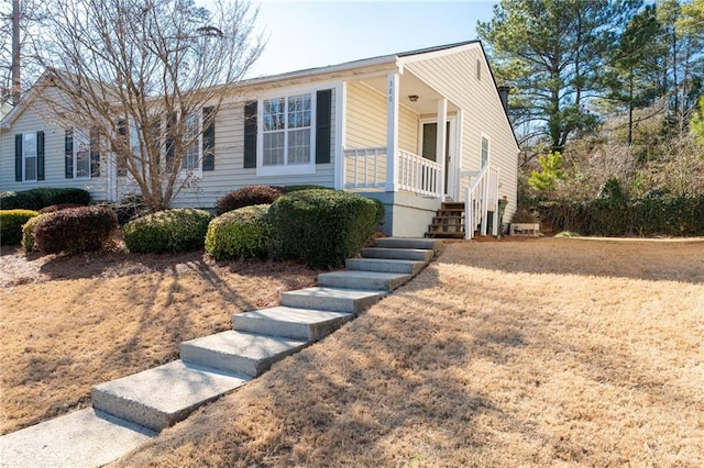 view of front of property with a front lawn