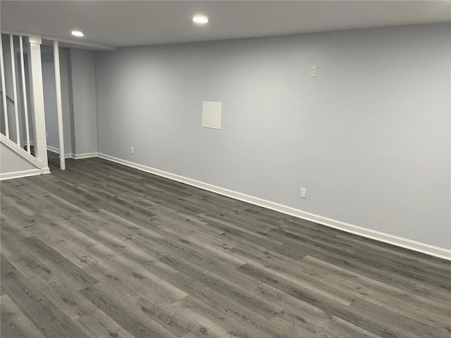 basement featuring dark wood-type flooring