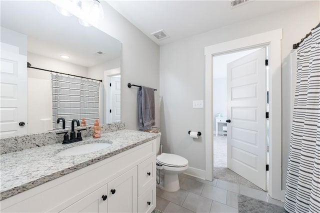 bathroom with tile patterned flooring, visible vents, vanity, and toilet