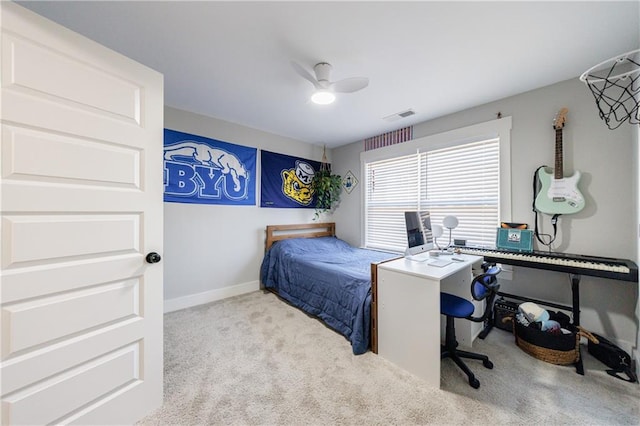 bedroom with carpet floors, a ceiling fan, visible vents, and baseboards