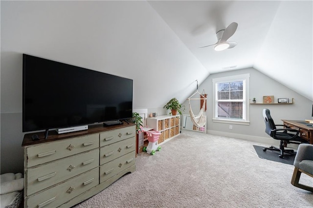 carpeted office with vaulted ceiling, baseboards, and ceiling fan