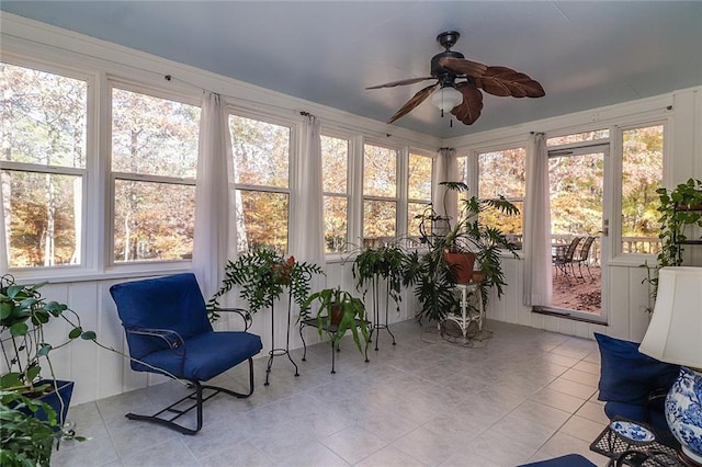 sunroom / solarium with plenty of natural light and ceiling fan