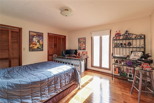 bedroom featuring hardwood / wood-style floors