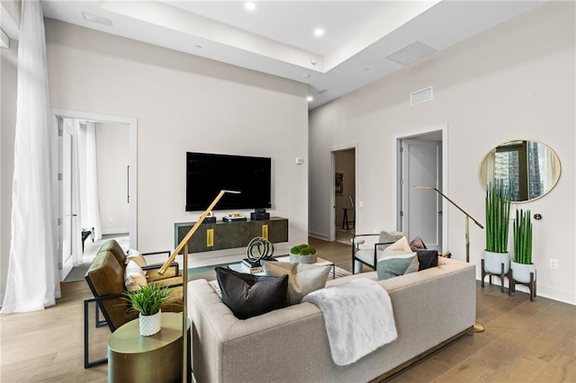 living room with light hardwood / wood-style floors