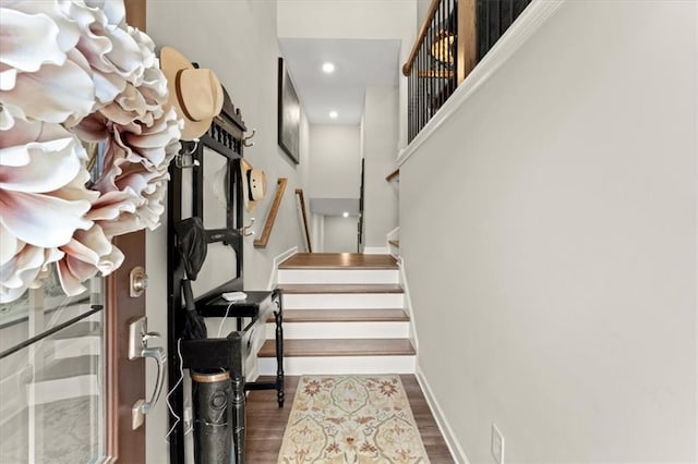 stairs with wood-type flooring