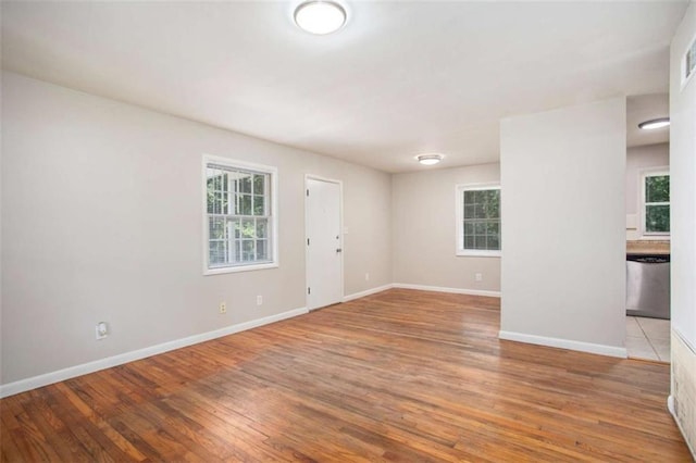 unfurnished room featuring light hardwood / wood-style floors