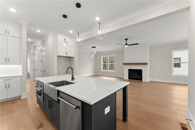 1419 Coretta Bnd, Atlanta, GA 30318 - kitchen with dishwasher, white cabinets, crown molding, ceiling fan, and recessed lighting
