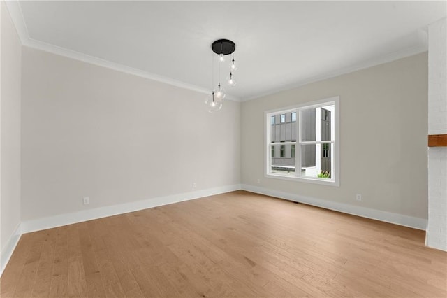 1419 Coretta Bnd, Atlanta, GA 30318 - empty room with ornamental molding, light wood-type flooring, and baseboards