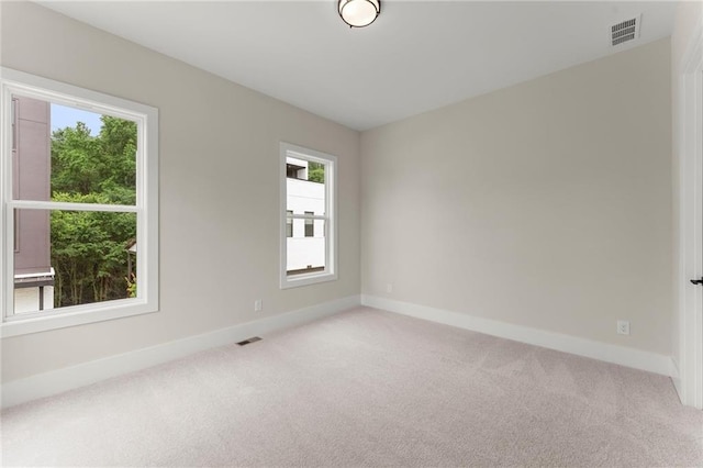 1419 Coretta Bnd, Atlanta, GA 30318 - unfurnished room with light carpet and baseboards