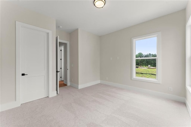 1419 Coretta Bnd, Atlanta, GA 30318 - unfurnished room with light carpet and baseboards