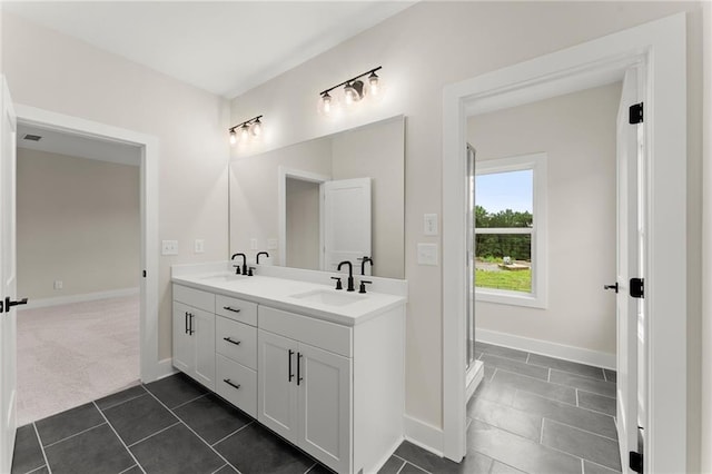 1419 Coretta Bnd, Atlanta, GA 30318 - full bath featuring tile patterned floors, double vanity, and baseboards