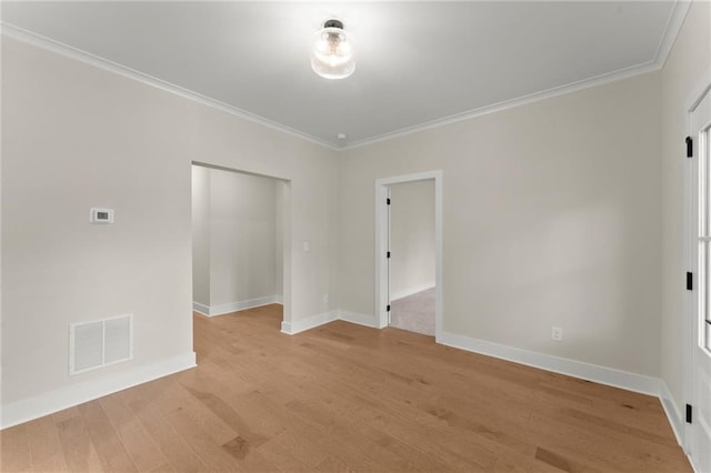 1419 Coretta Bnd, Atlanta, GA 30318 - spare room with ornamental molding, light wood finished floors, and baseboards