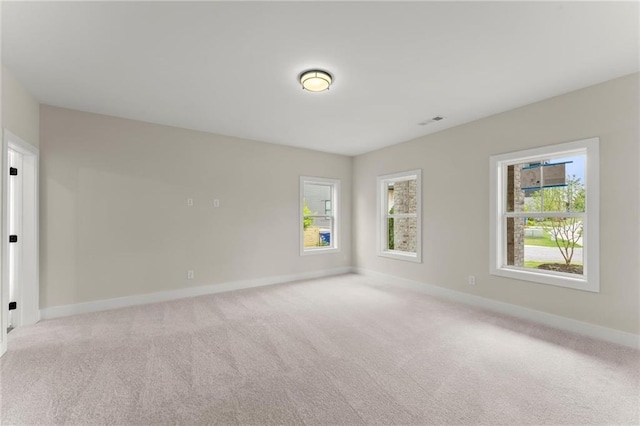 1419 Coretta Bnd, Atlanta, GA 30318 - empty room with carpet flooring, plenty of natural light, and baseboards