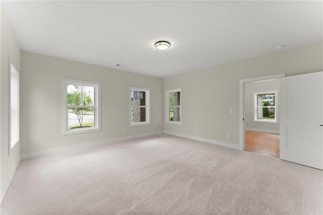 1419 Coretta Bnd, Atlanta, GA 30318 - spare room with light carpet and baseboards