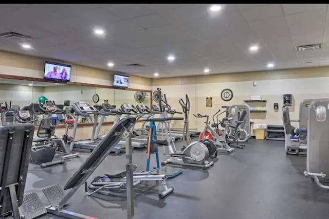 workout area featuring visible vents and recessed lighting