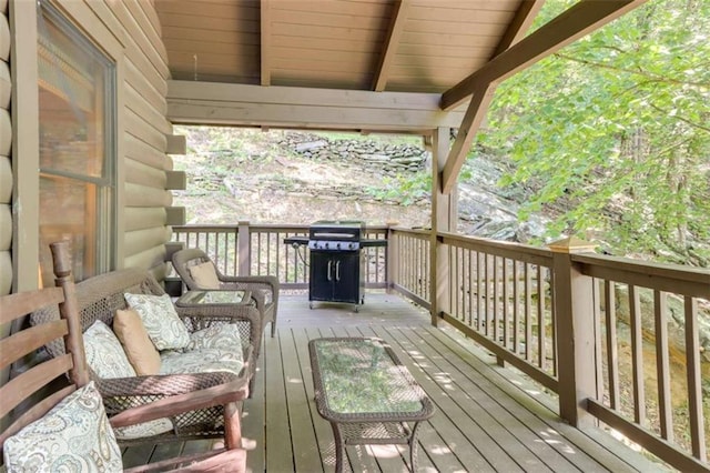 wooden terrace with grilling area