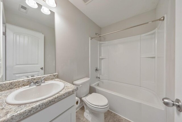 full bath with toilet, vanity, shower / tub combination, and tile patterned floors