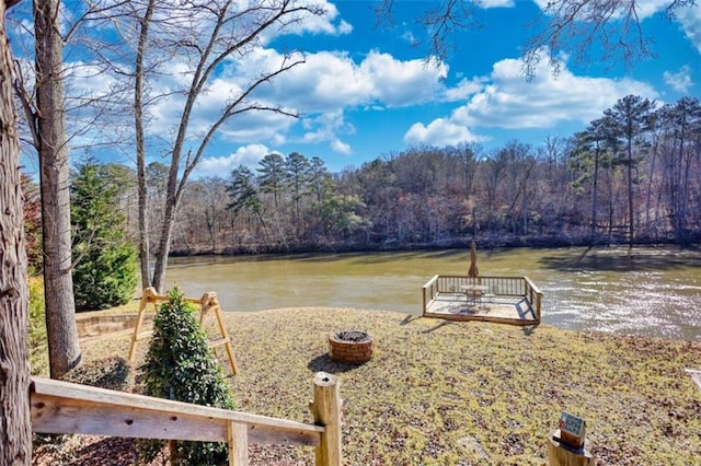 view of water feature with a wooded view