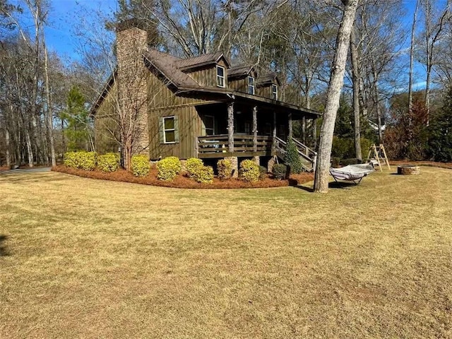 view of property exterior featuring a lawn and a chimney