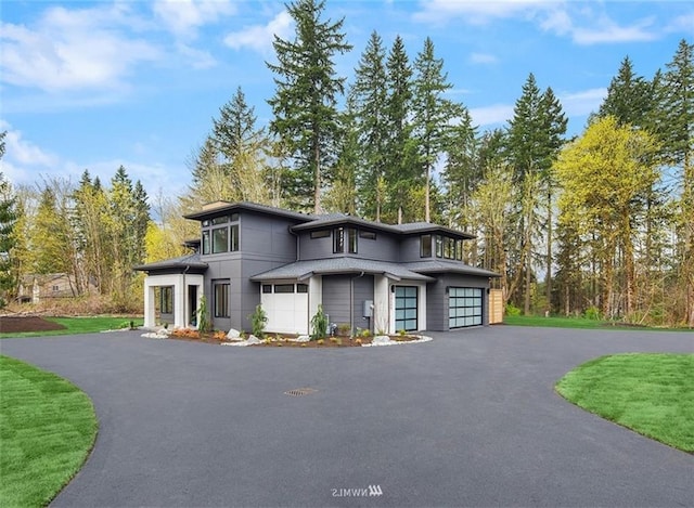 prairie-style house featuring a garage