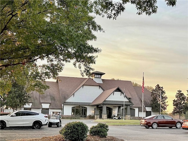 view of outdoor building at dusk