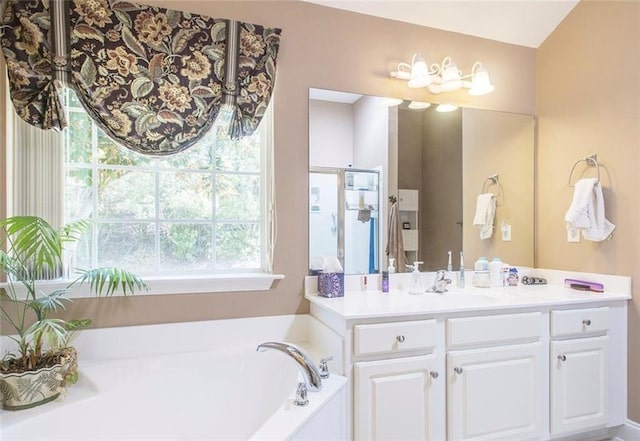 bathroom with plus walk in shower and vanity