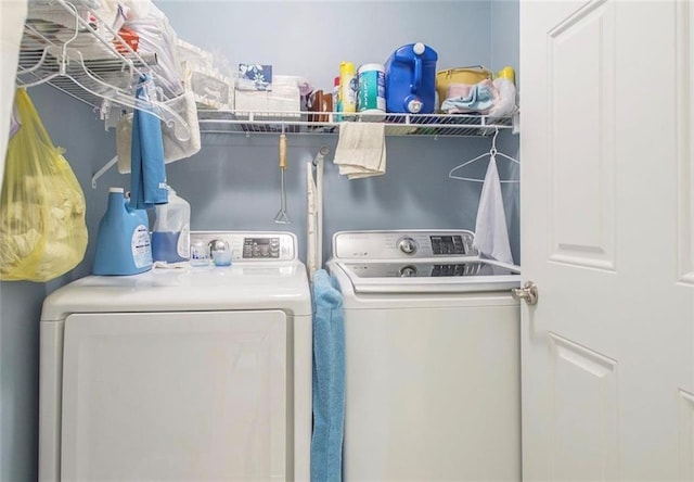 washroom with separate washer and dryer