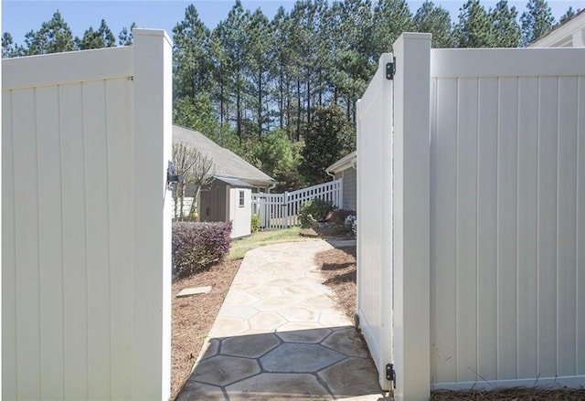 view of patio / terrace with a shed