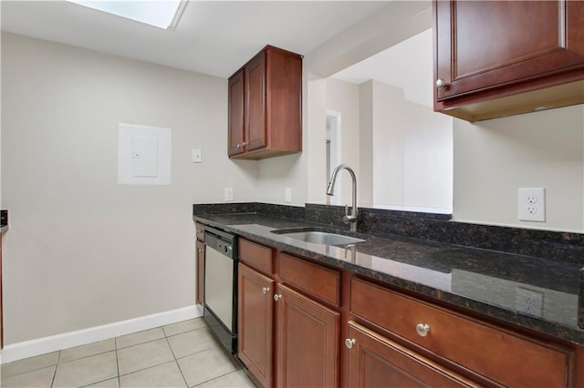 kitchen featuring light tile patterned flooring, dark stone countertops, sink, and stainless steel dishwasher