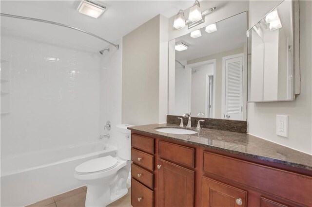 full bathroom featuring vanity, shower / bathtub combination, toilet, and tile patterned flooring