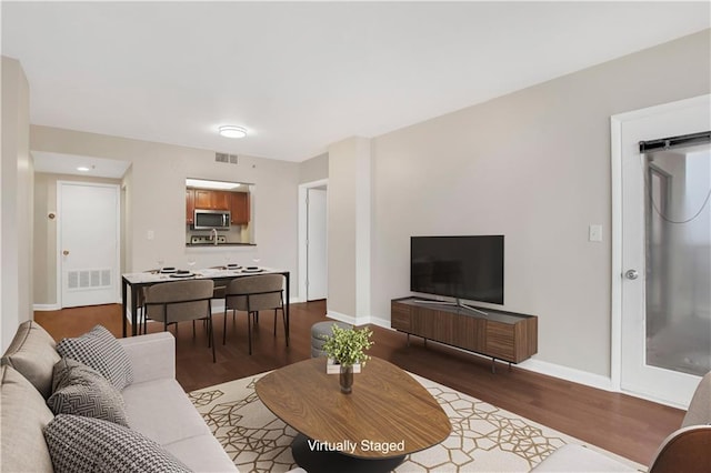 living room featuring hardwood / wood-style flooring