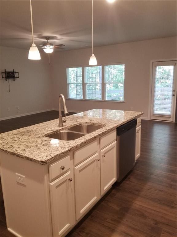 7298 Rockhouse Rd Unit 5, Austell, GA 30168 - kitchen featuring stainless steel dishwasher, a sink, dark wood-style flooring, and decorative light fixtures