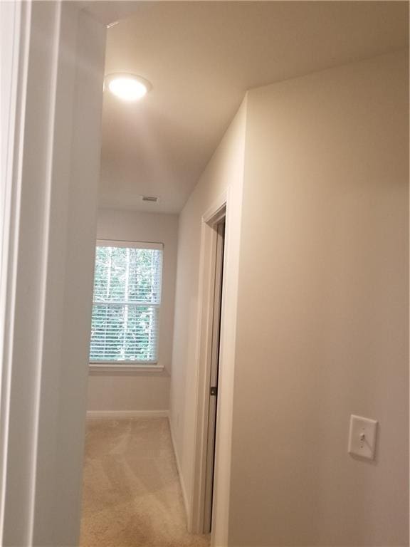 7298 Rockhouse Rd Unit 5, Austell, GA 30168 - hallway with baseboards and light carpet