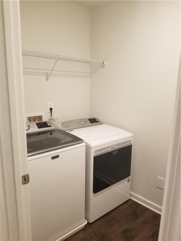 7298 Rockhouse Rd Unit 5, Austell, GA 30168 - laundry area with washing machine and dryer, dark wood finished floors, and baseboards
