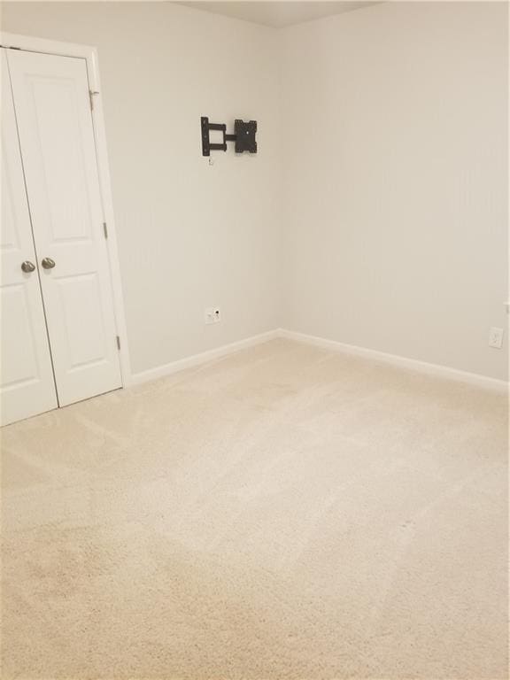 7298 Rockhouse Rd Unit 5, Austell, GA 30168 - empty room featuring light colored carpet and baseboards