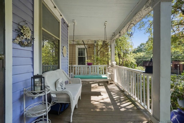 wooden deck with a porch