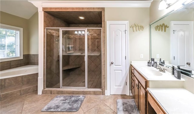 bathroom featuring vanity, crown molding, tile patterned floors, and independent shower and bath