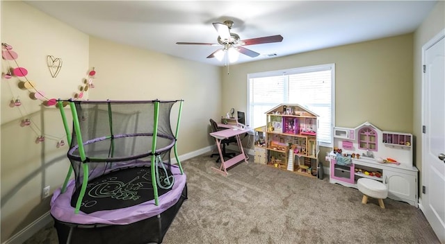 playroom with carpet flooring and ceiling fan