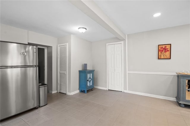 3595 S St NW, Duluth, GA 30096 - kitchen with freestanding refrigerator, baseboards, light tile patterned floors, and recessed lighting