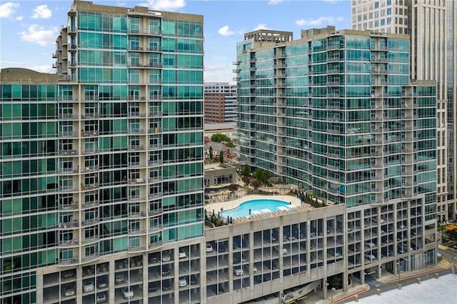 view of building exterior featuring a view of city