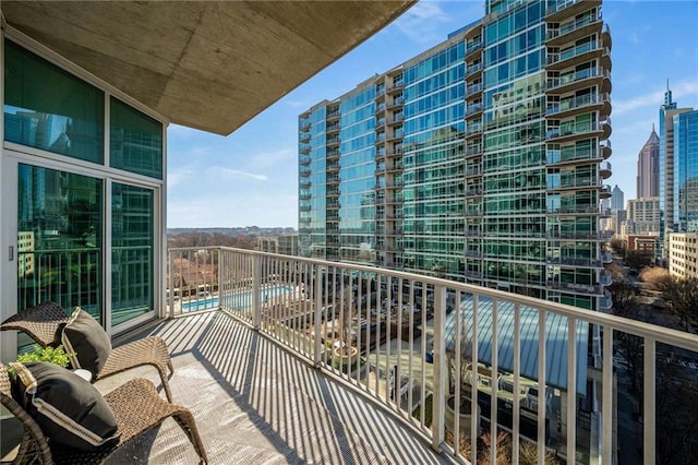 balcony featuring a view of city