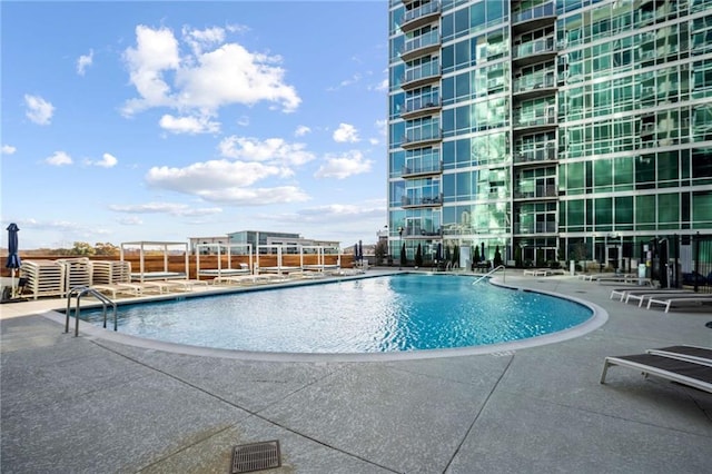 community pool with a patio