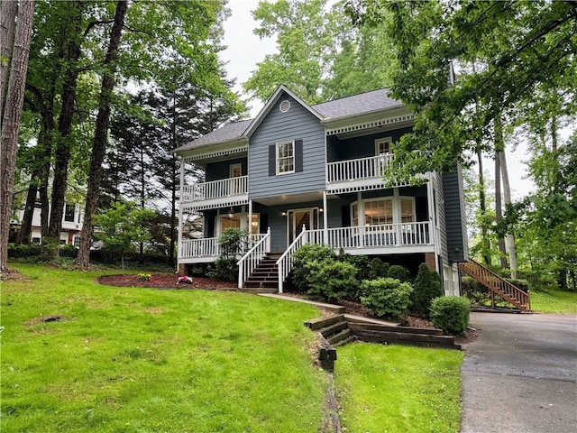 5307 Red Rock Trce, Powder Springs, GA 30127 - view of front of home with a porch, a front yard, and stairs