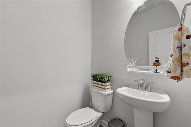 bathroom featuring toilet