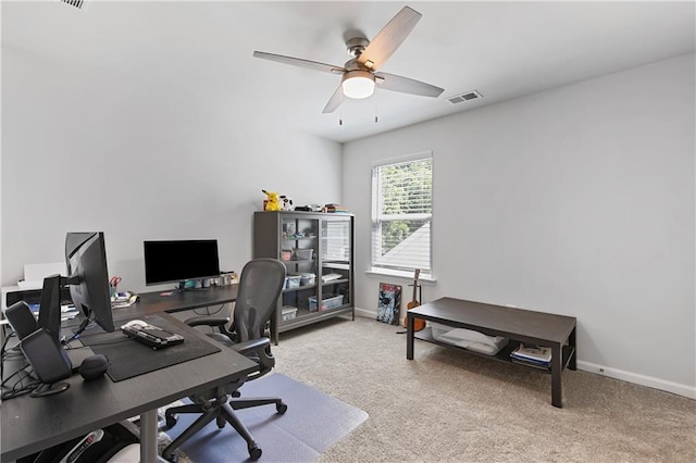 office featuring ceiling fan and carpet floors