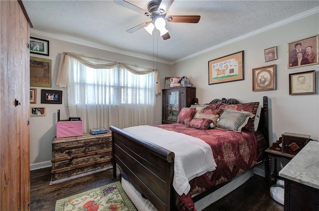 bedroom featuring wood finished floors, baseboards, ceiling fan, a textured ceiling, and crown molding