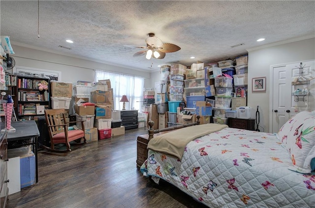 bedroom featuring ornamental molding, a textured ceiling, wood finished floors, recessed lighting, and ceiling fan