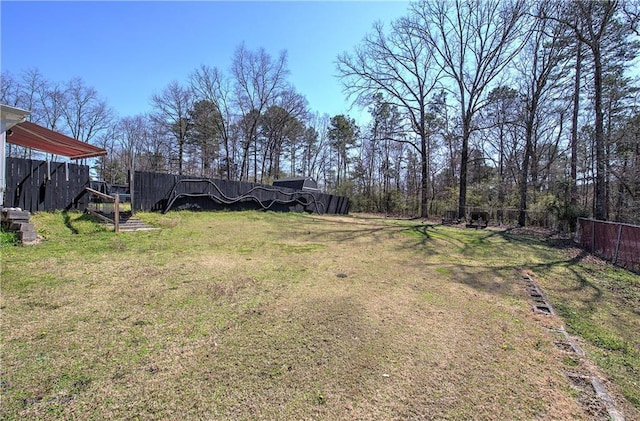 view of yard with fence