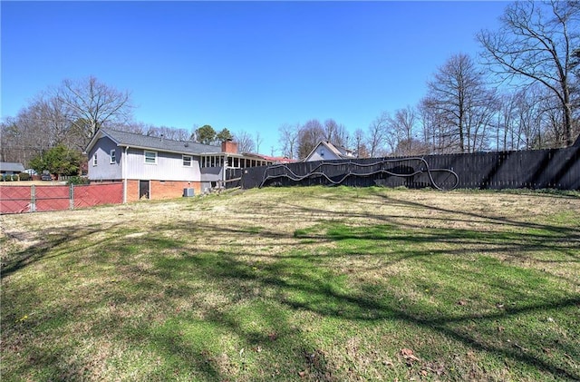 view of yard featuring fence